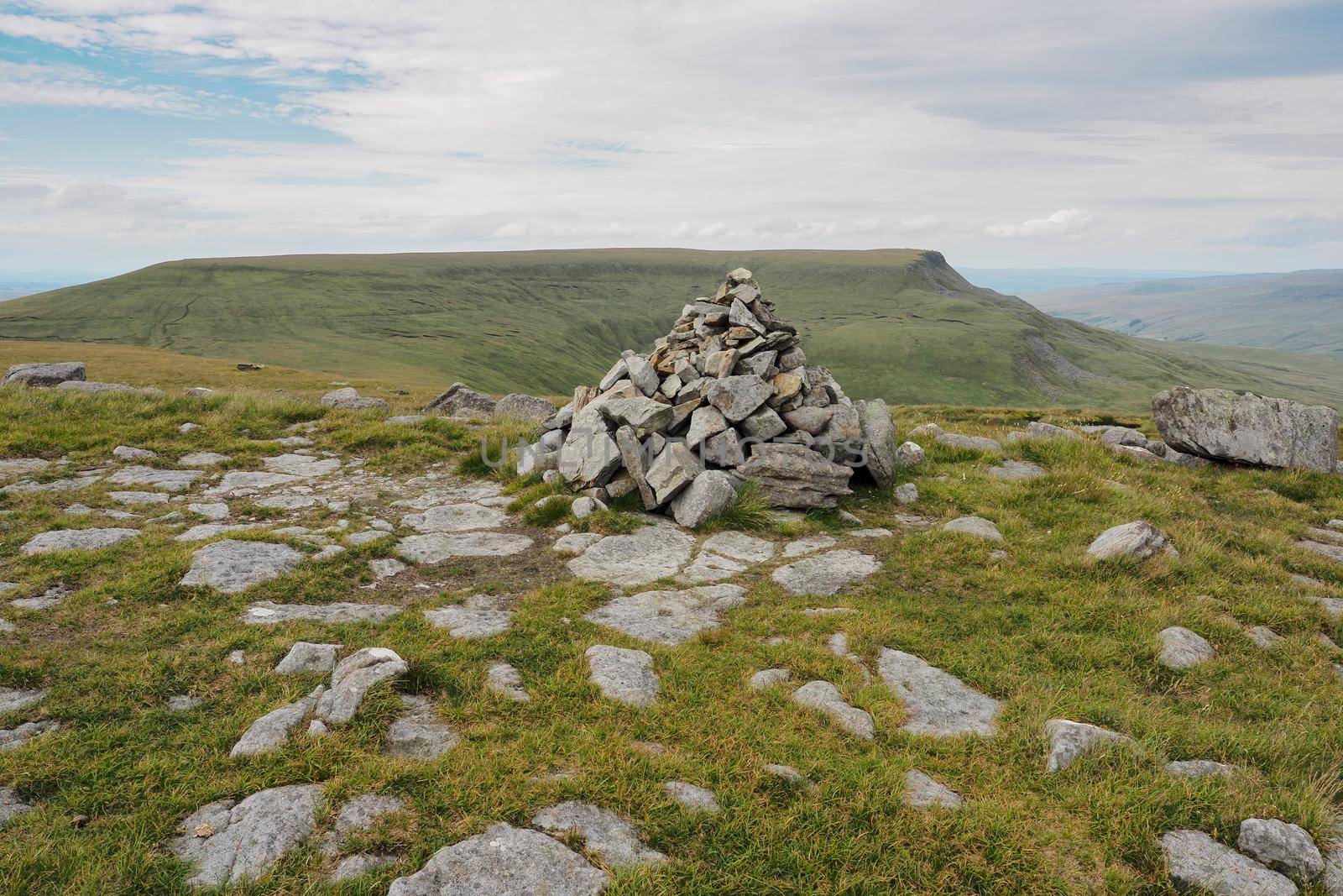 View from the summit of Swarth Fell over to Wild Boar Fell and the cairns on High White Scar, Eden Valley, Cumbria, UK