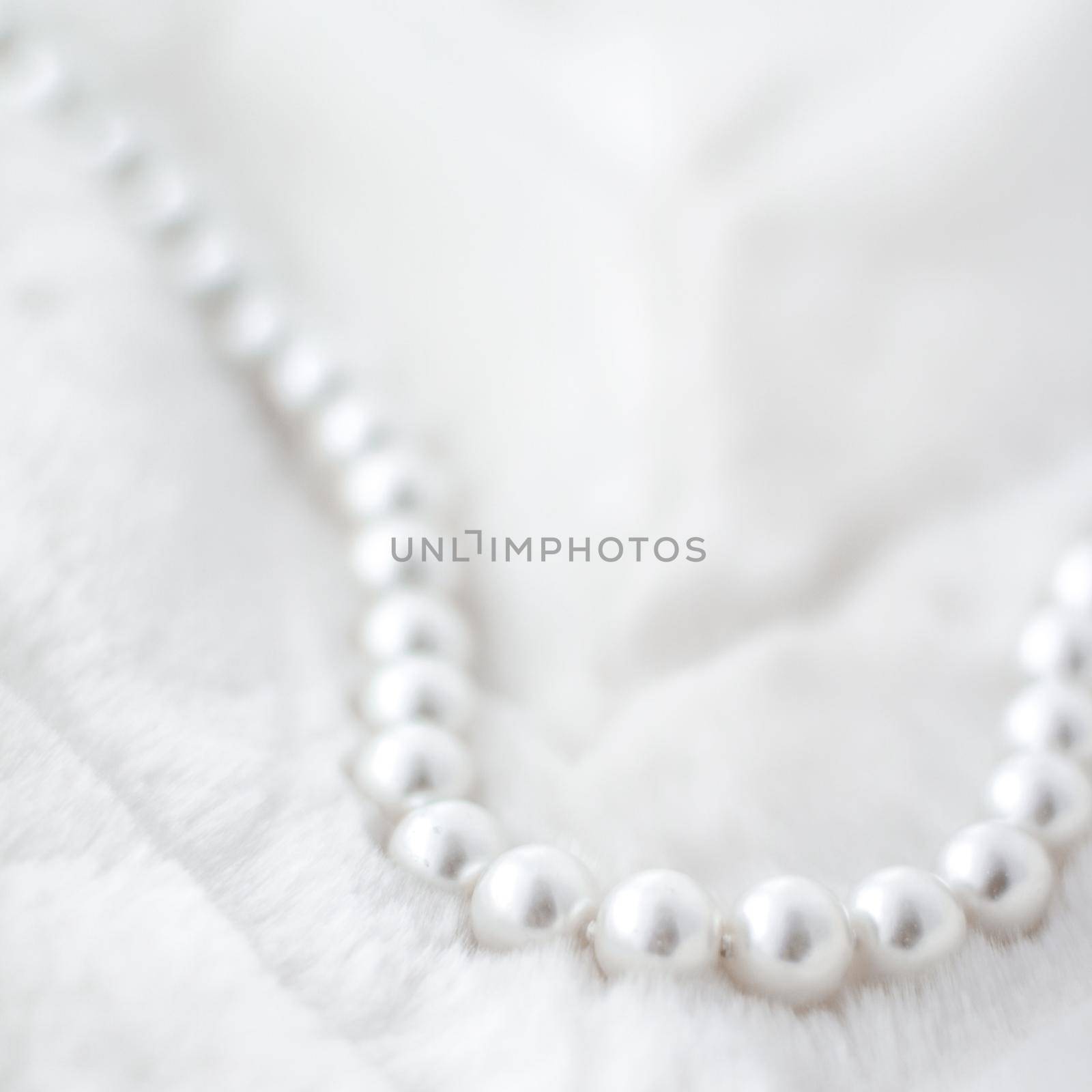 Jewelry branding, elegance and sale concept - Winter holiday jewellery fashion, pearl necklace on fur background, glamour style present and chic gift for luxury jewelery brand shopping, banner design