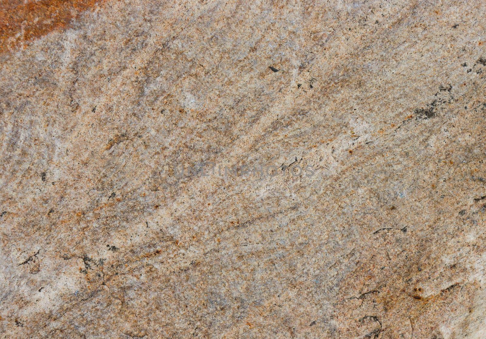 Texture for design with copy space. The texture of the stone surface is brown.