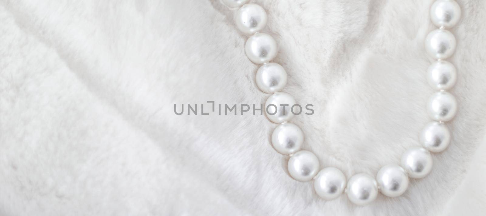 Winter holiday jewellery fashion, pearl necklace on fur background, glamour style present and chic gift for luxury jewelery brand shopping, banner design by Anneleven