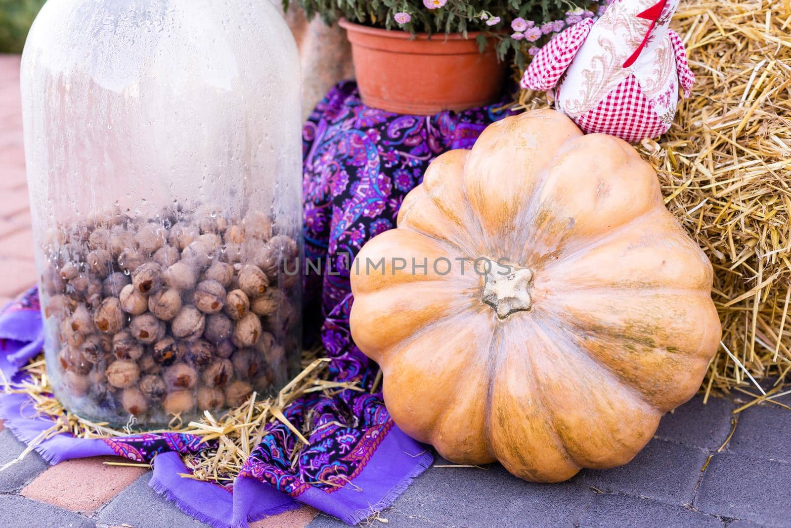 Yellow and orange pumpkins at the fair. Pumpkins in baskets and boxes. Many different pumpkins for sale. Concept of autumn, harvest and celebration by Andelov13