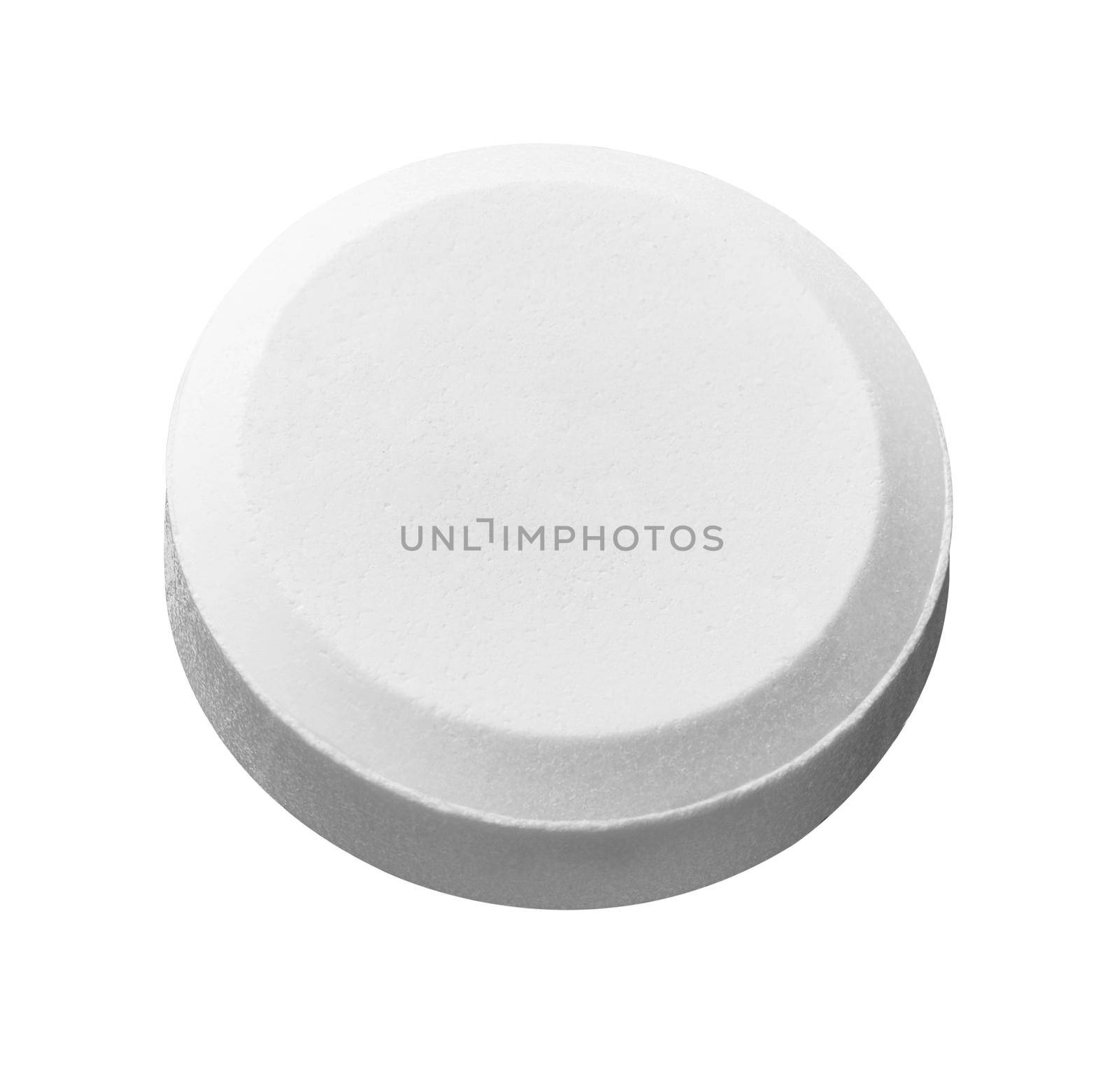 close up of a white pill on white background