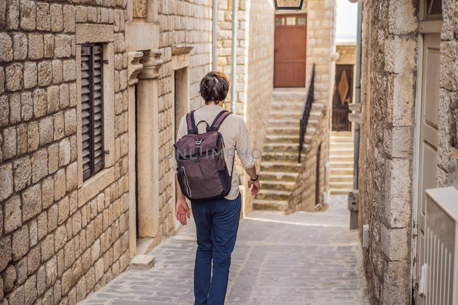 The man in Ulcinj town in Montenegro. Clock Tower of Ulcinj Sahat Kulla. Lami Mosque. Ulcinj is a popular tourist destination in the summer on the southern Adriatic coast of Montenegro. Ulqin.