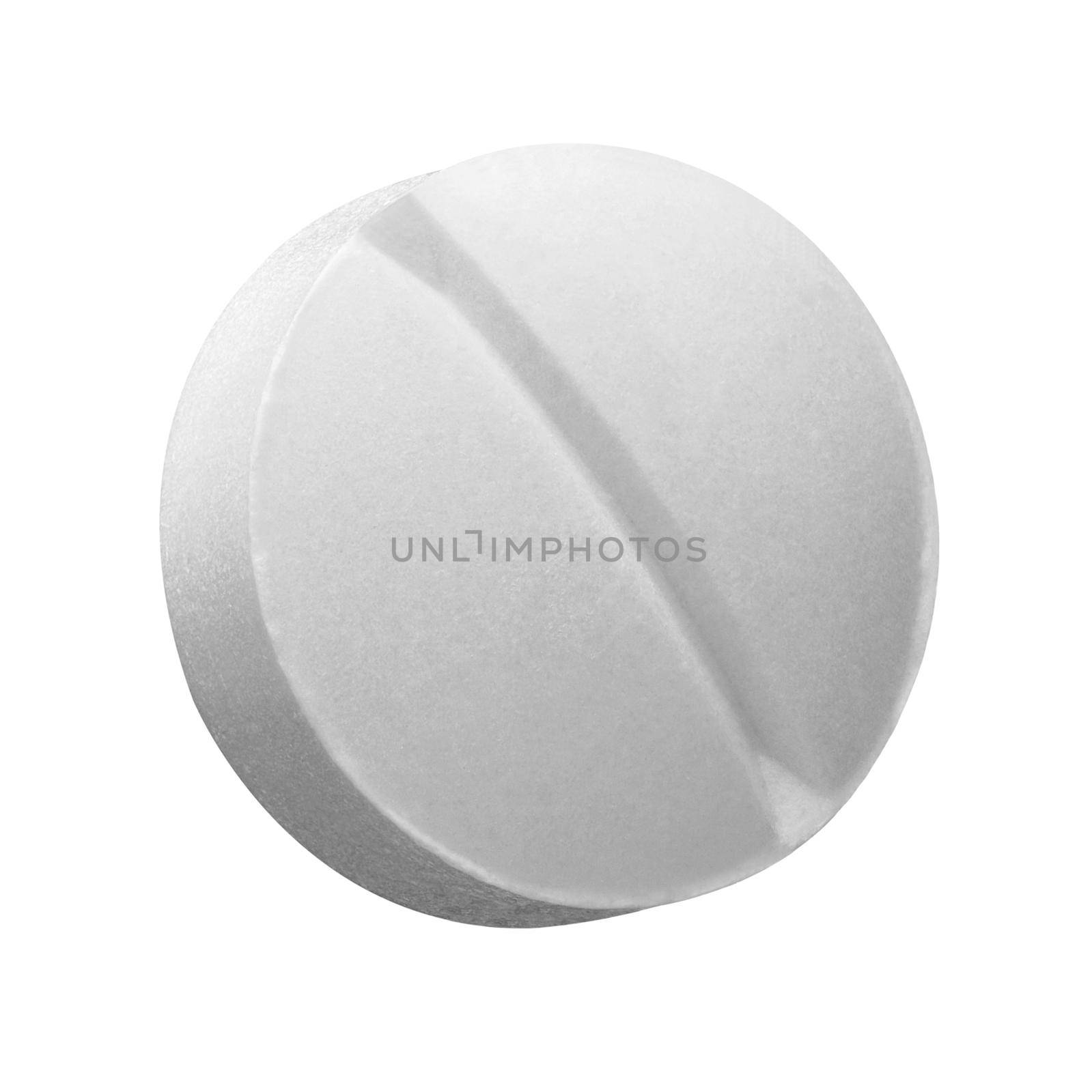 close up of a white pill on white background