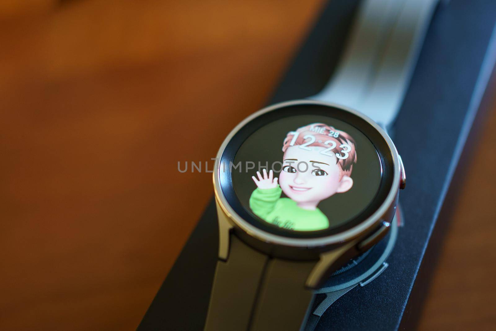Granada, Andalusia, Spain - September 28, 2022: New Samsung Watch 5 Pro with watch face of AR Emoji by javiindy