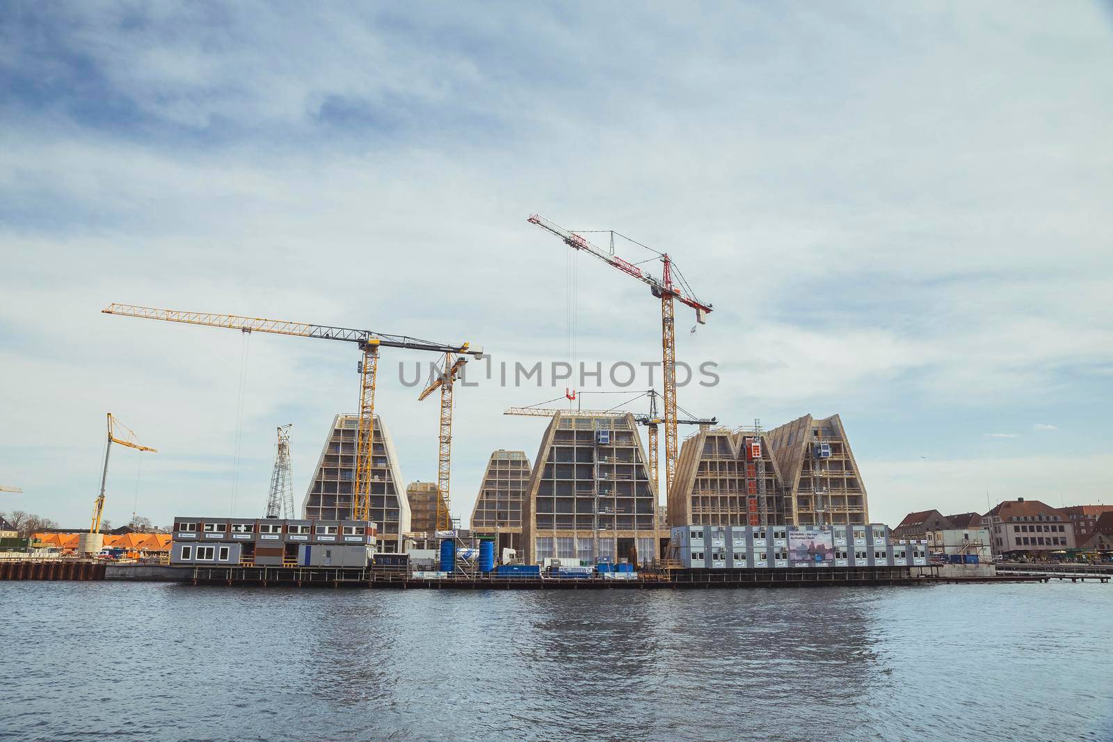 Copenhagen, Denmark, March 2022: Construction of apartment buildings on the seashore.