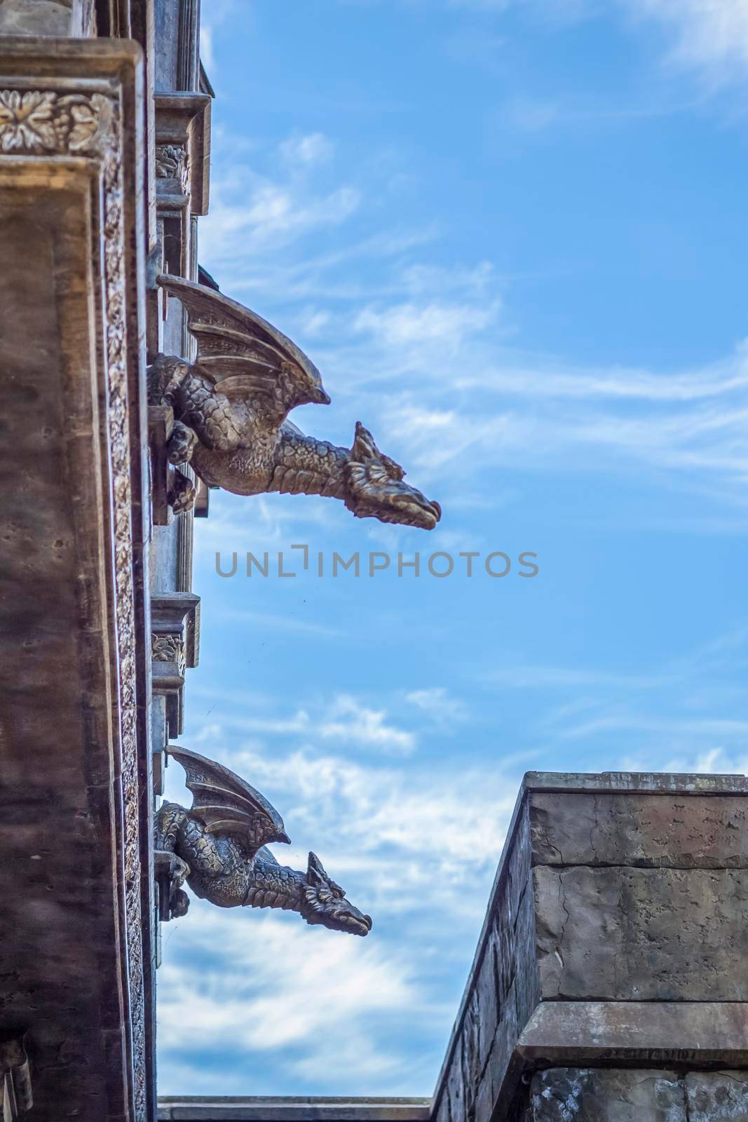 Antiquity in detail. Decoration of houses, balconies, windows, sculptures, walls. Elements of architectural design of buildings. Old plaster, Stone decorations. Elements of Gothic architecture.