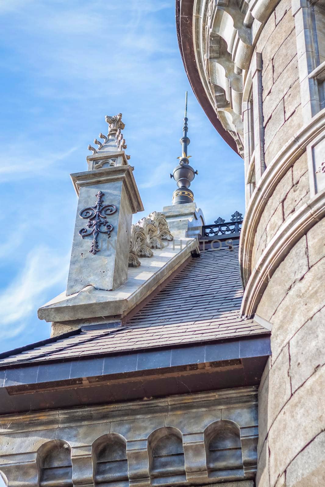 Antiquity in detail. Decoration of houses, balconies, windows, sculptures, walls. Elements of architectural design of buildings. Old plaster, Stone decorations. Elements of Gothic architecture.