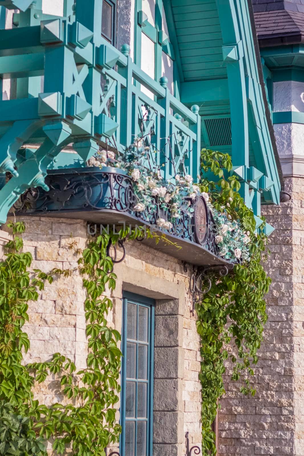 Antiquity in detail. Decoration of houses, balconies, windows, sculptures, walls. Elements of architectural design of buildings. Old plaster, Stone decorations. Elements of Gothic architecture.