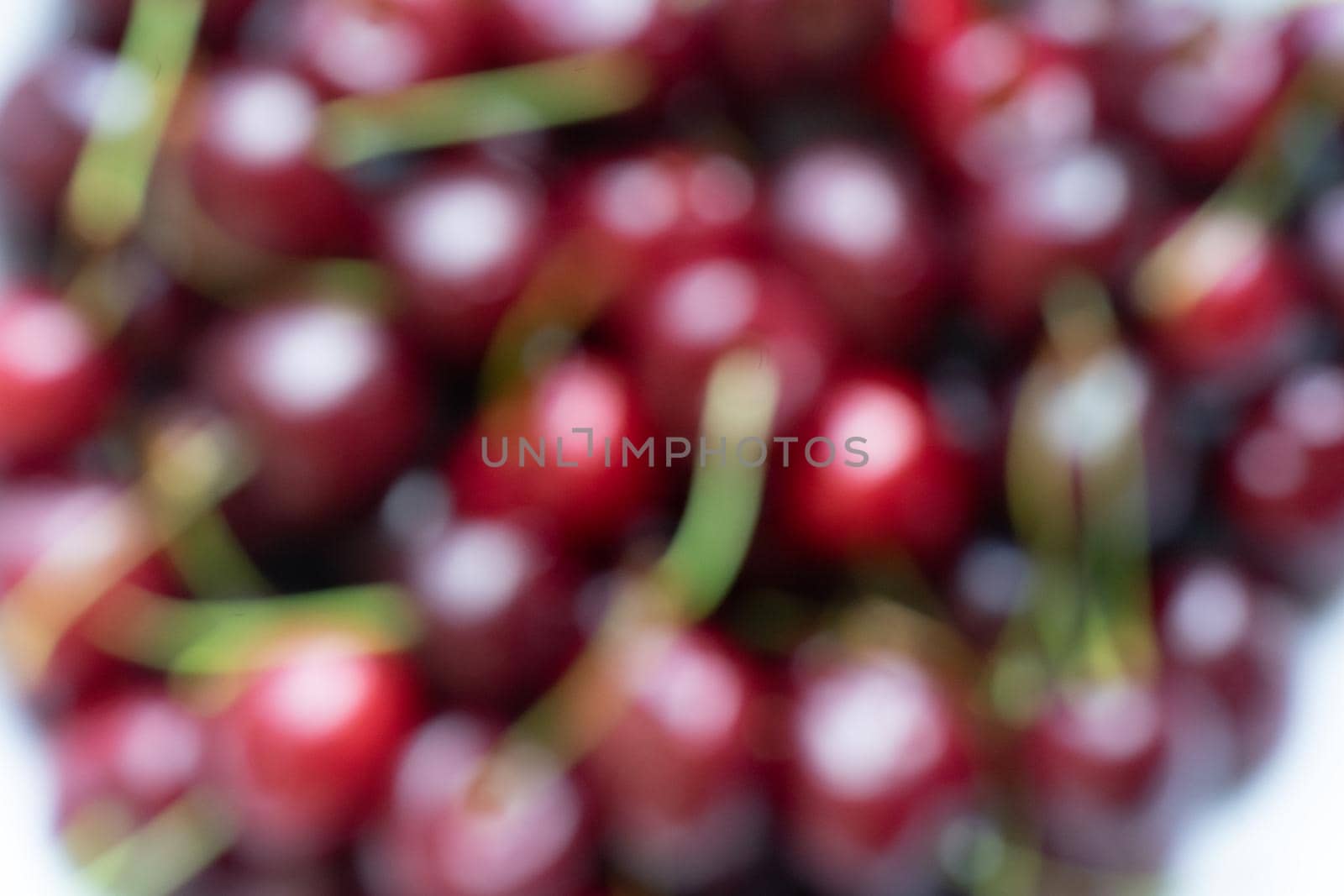 Blurred photo of cherries and cherries. High quality photo