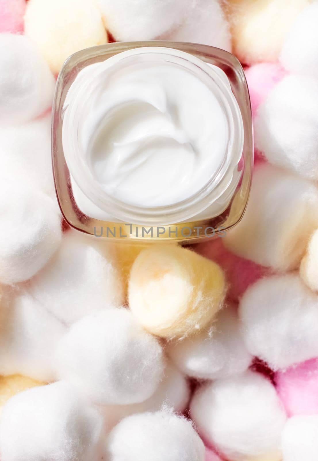 Cosmetic branding, moisturizing emulsion and facial care concept - Luxury face cream for sensitive skin and eco cotton balls on background, spa cosmetics and natural skincare beauty brand product