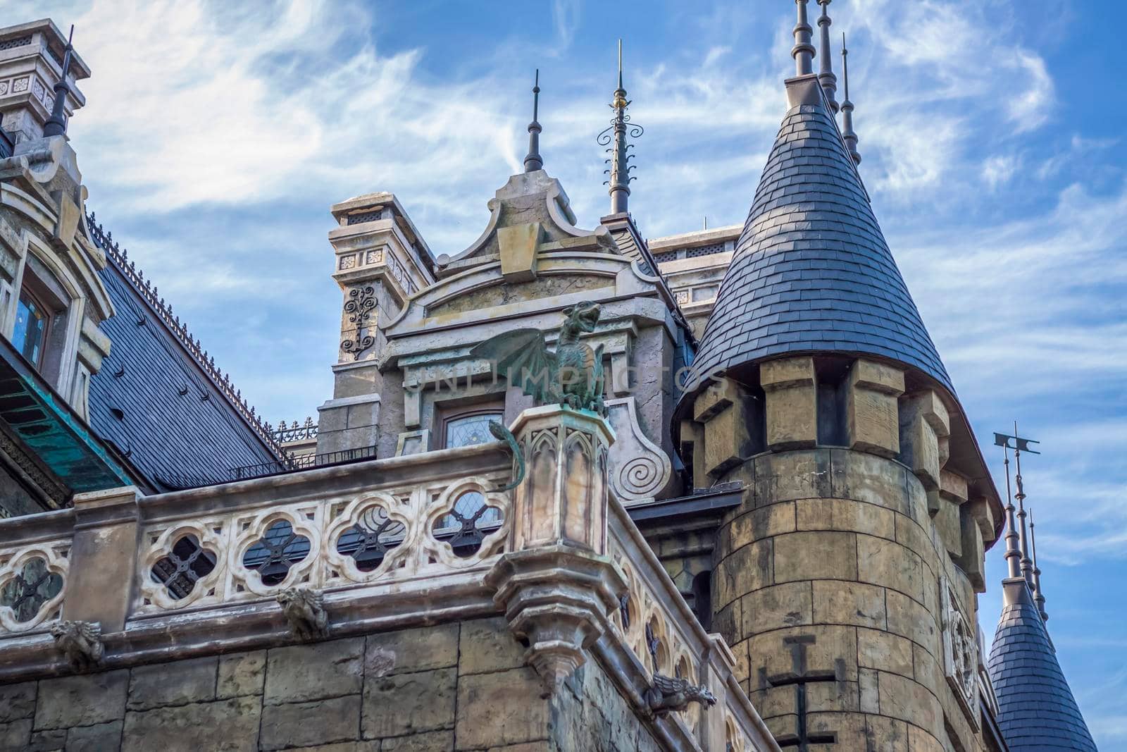 Antiquity in detail. Decoration of houses, balconies, windows, sculptures, walls. Elements of architectural design of buildings. Old plaster, Stone decorations. Elements of Gothic architecture.