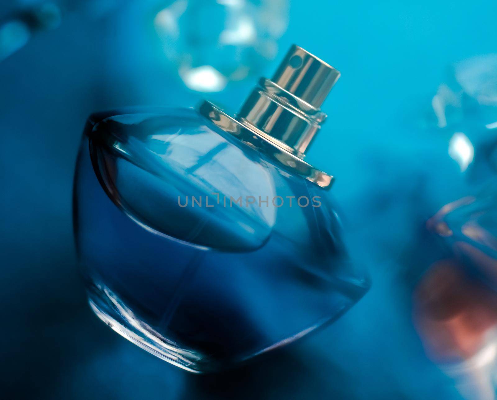 Perfumery, cosmetics and branding concept - Perfume bottle under blue water, fresh sea coastal scent as glamour fragrance and eau de parfum product as holiday gift, luxury beauty spa brand present