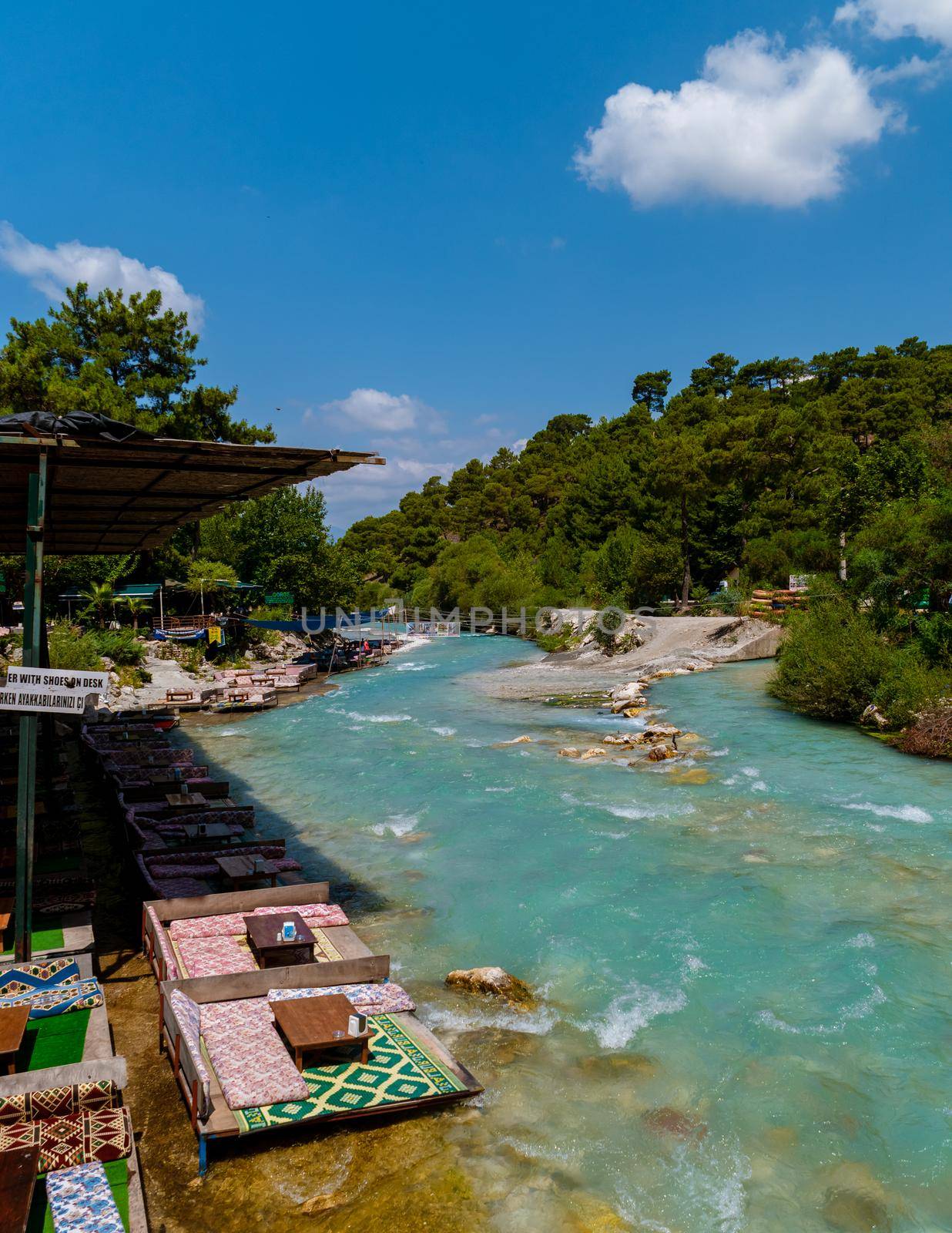 Saklikent Turkey Colorful Restaurant in the river near famous Saklikent canyon in Turkey by fokkebok