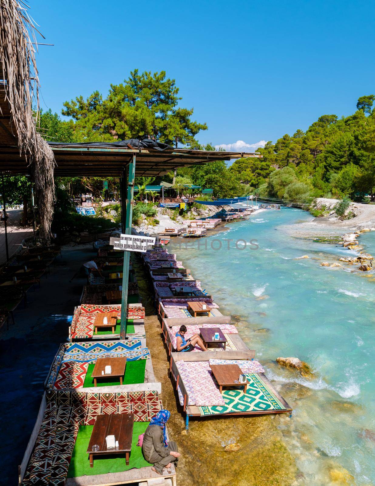 Saklikent Turkey Colorful Restaurant in the river near famous Saklikent canyon in Turkey by fokkebok