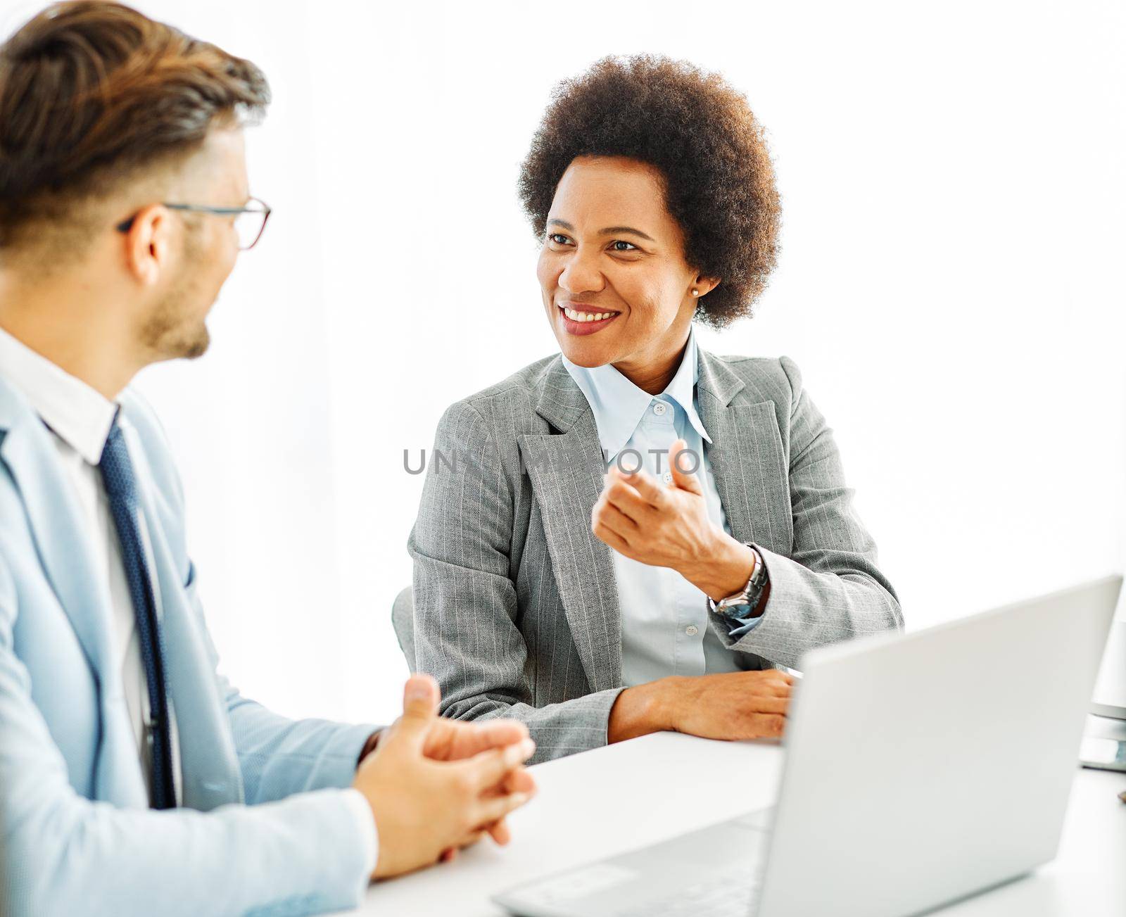 business businesswoman leader black african american meeting office talking portrait woman laptop by Picsfive