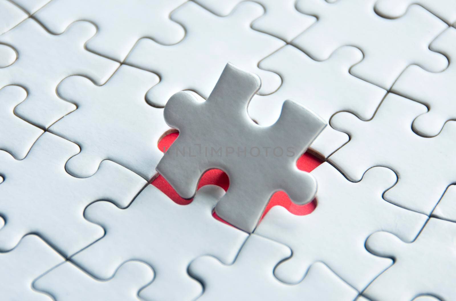 Copy space of white jigsaw puzzle