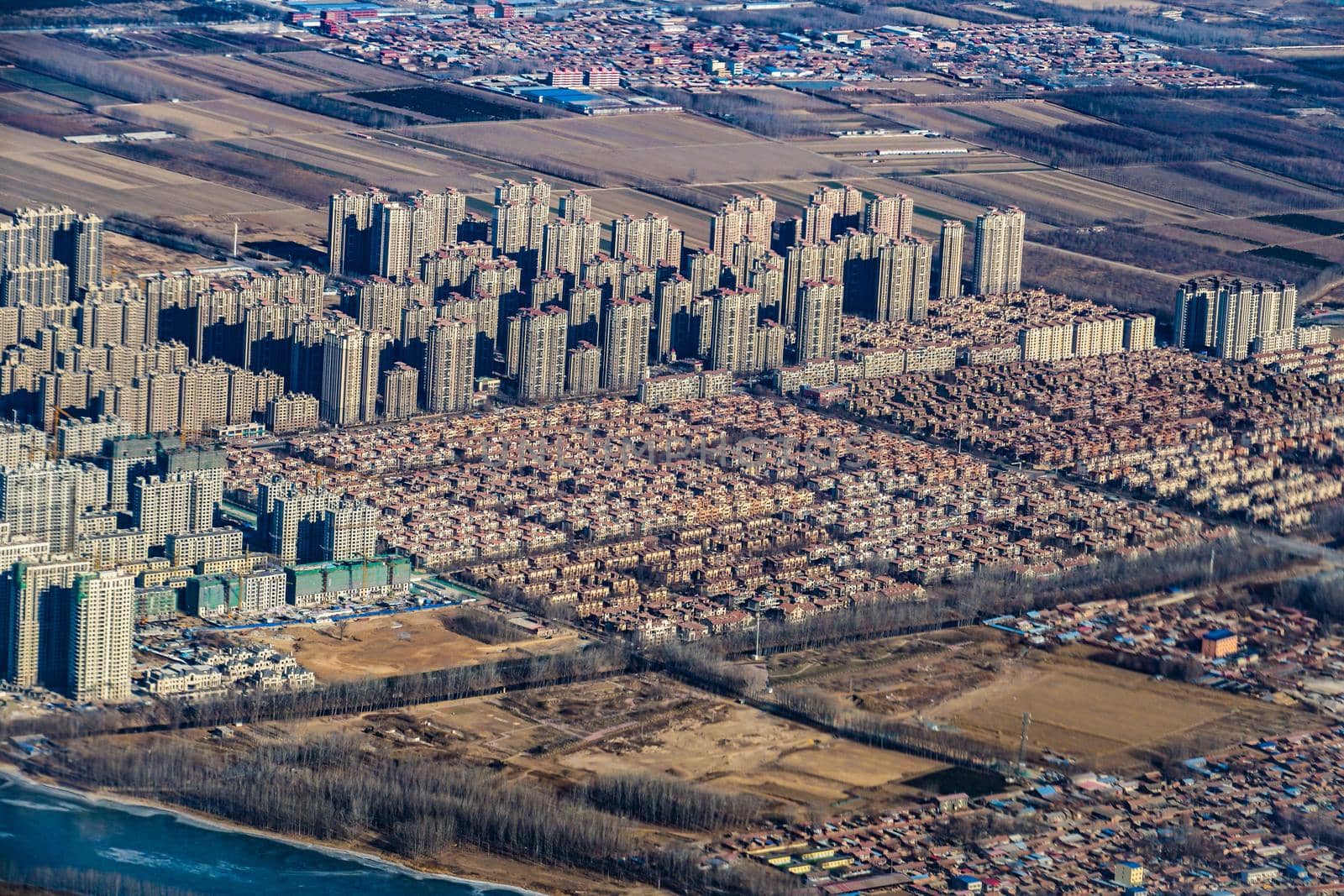 Housing district of China and Beijing seen from the plane. Shooting Location: China, Beijing