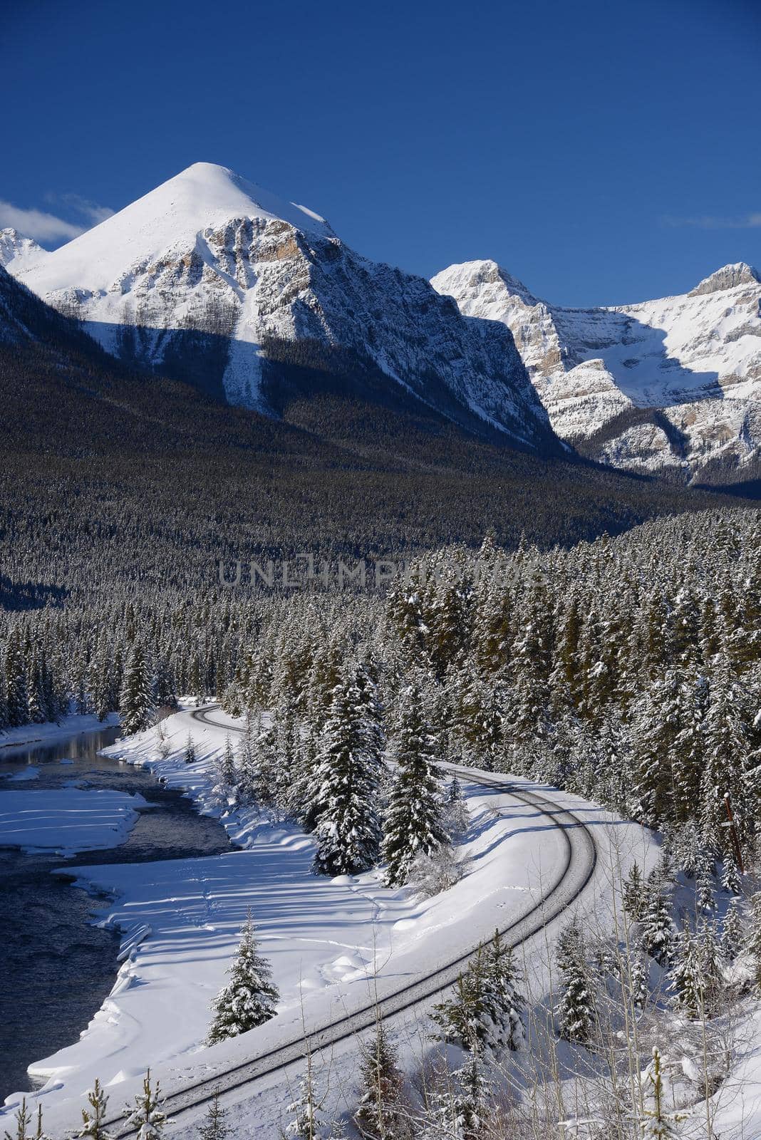 train curve at canadian rockies in winter