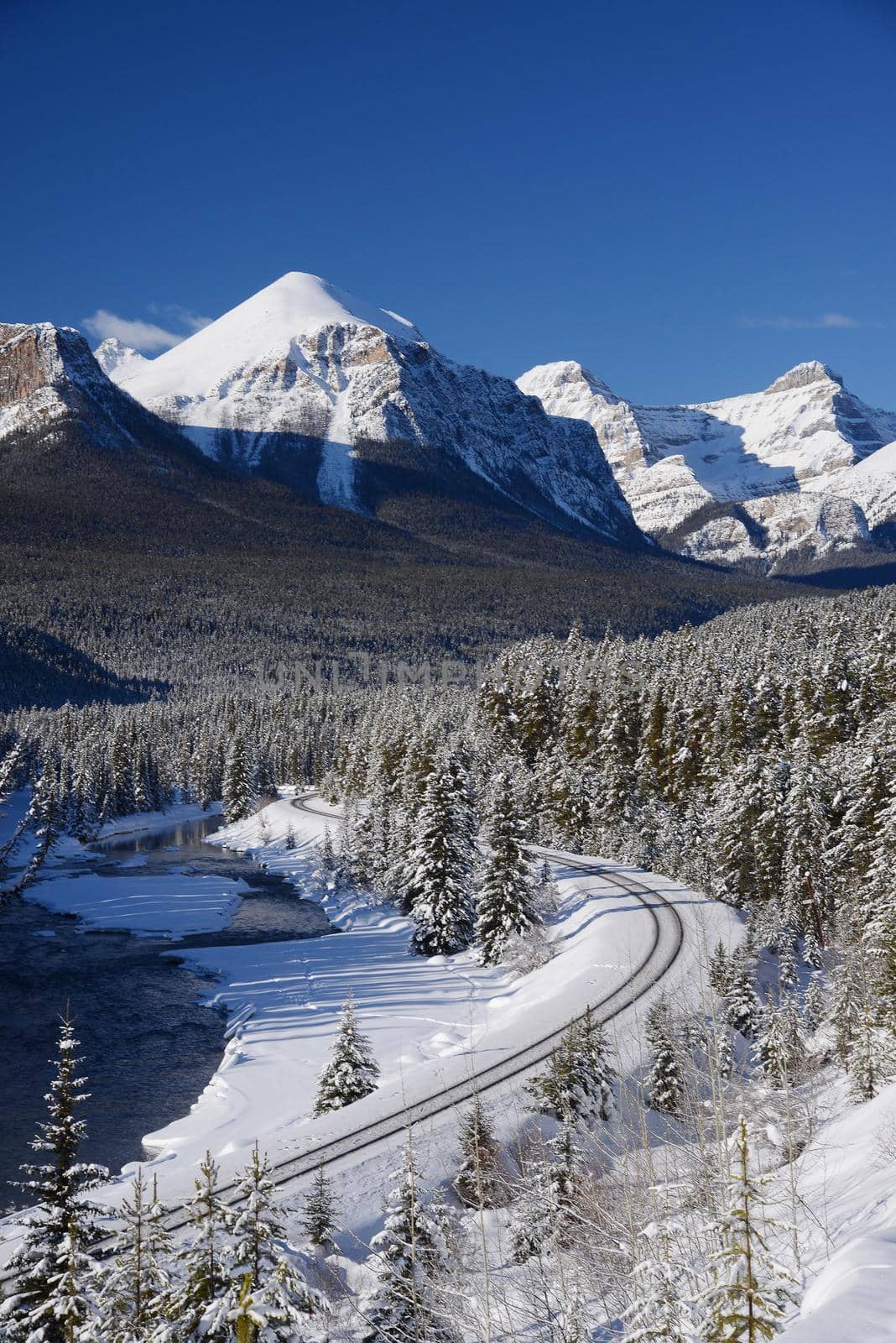 train curve at canadian rockies in winter