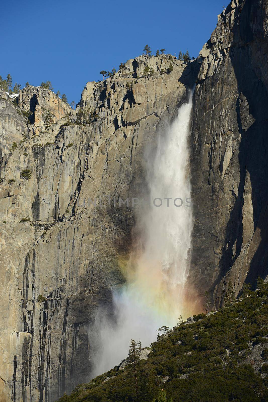 yosemite falls with rainbow in the morning