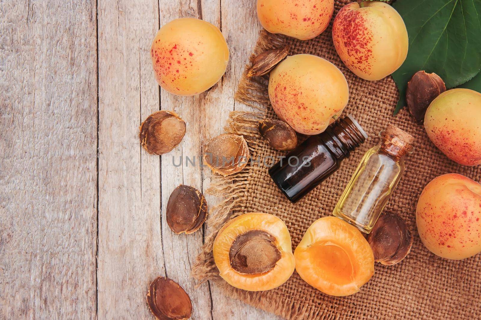 apricot oil in a small jar. selective focus. nature.