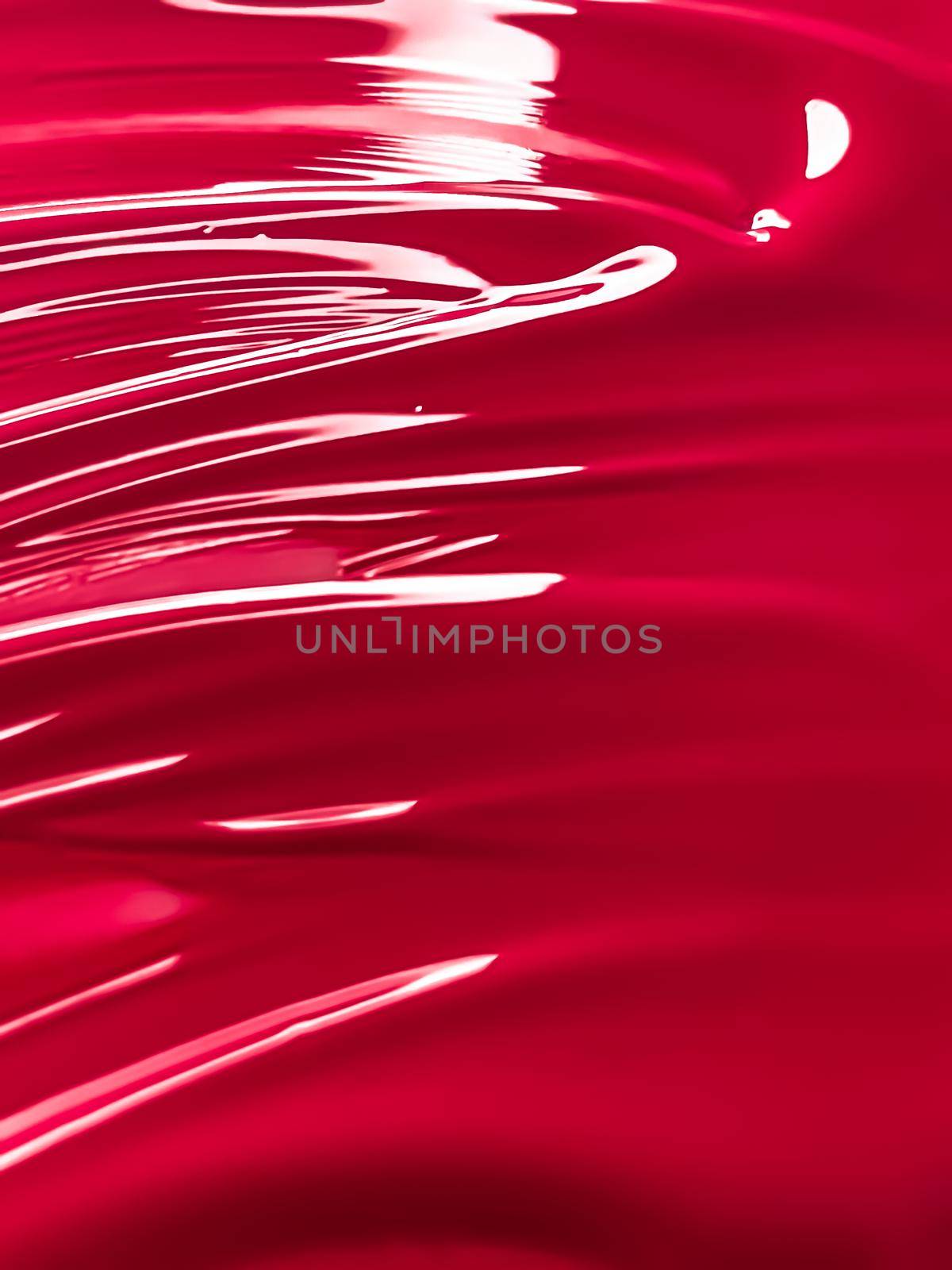 Glossy red cosmetic texture as beauty make-up product background, skincare cosmetics and luxury makeup brand design concept