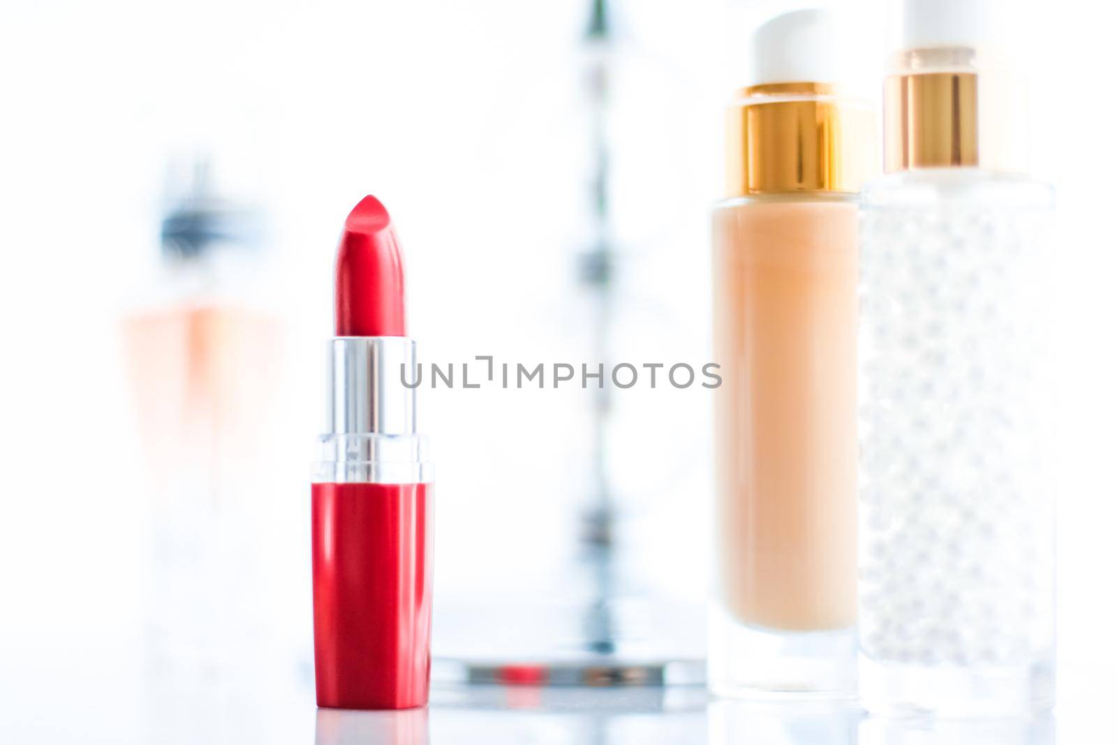 Cosmetic branding, girly and glamour concept - Cosmetics, makeup products on dressing vanity table, lipstick, foundation base, nailpolish and eyeshadows for luxury beauty and fashion brand ads design