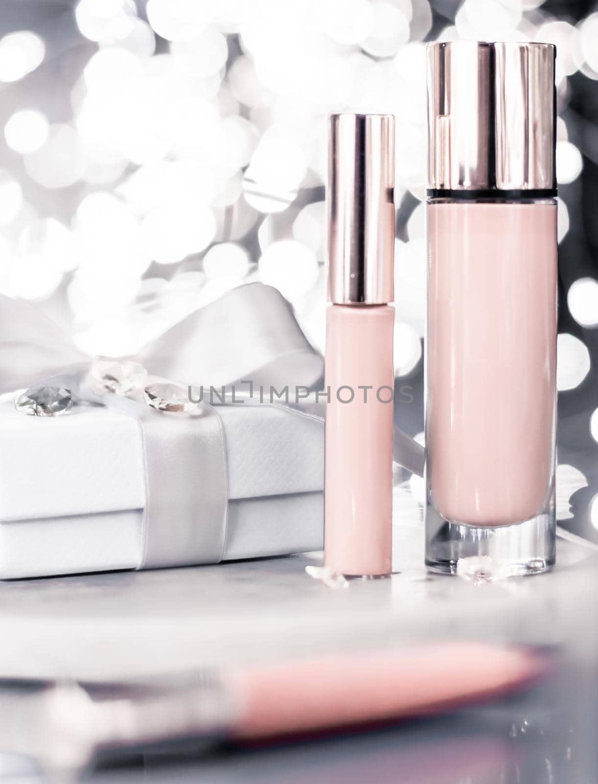 Cosmetic branding, Christmas glitter and girly blog concept - Holiday make-up foundation base, concealer and white gift box, luxury cosmetics present and blank label products for beauty brand design