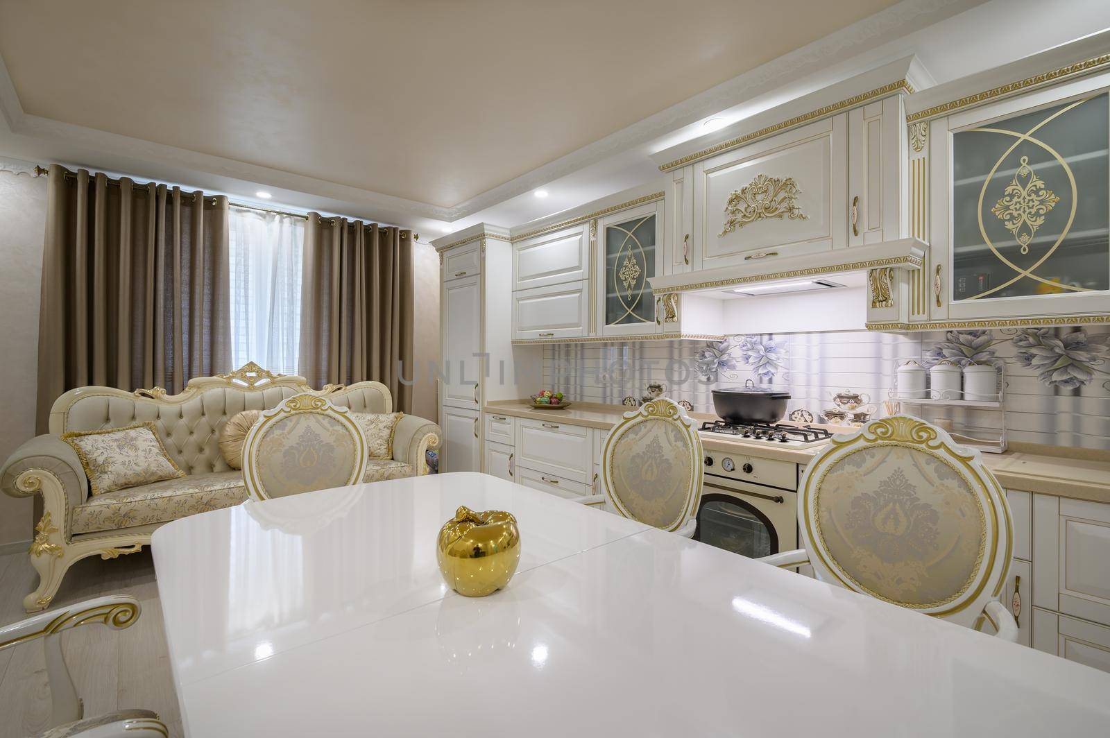 Interior renovation showcase of rich classic white kitchen