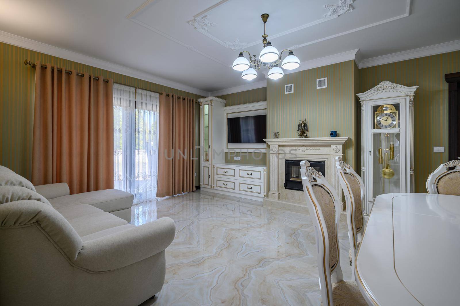 Classic living room interior design. Spacious room, luxury marble floor, elegant chairs and even fireplace