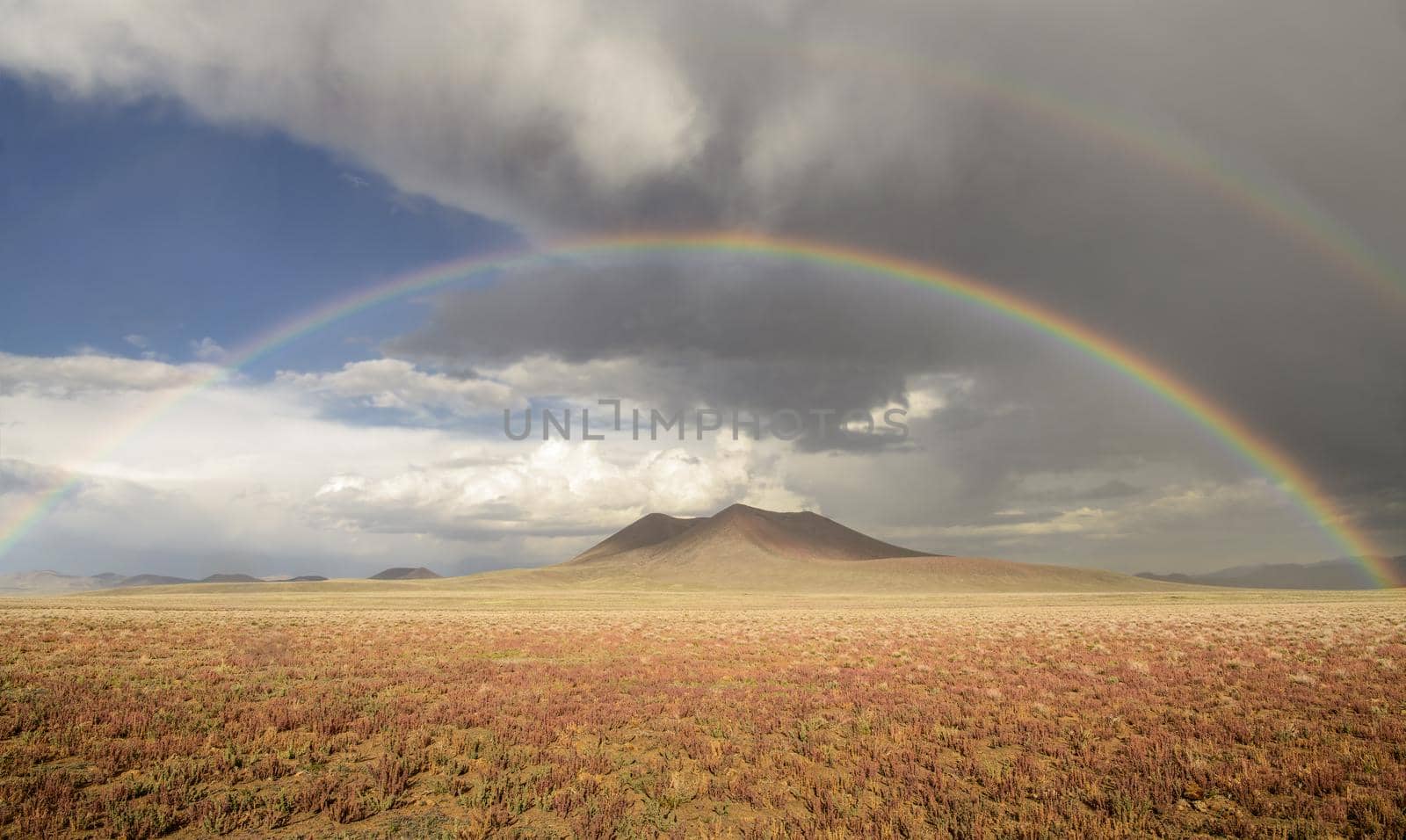 Rainbow Shining over Easy Chair Volcano Cone by lisaldw