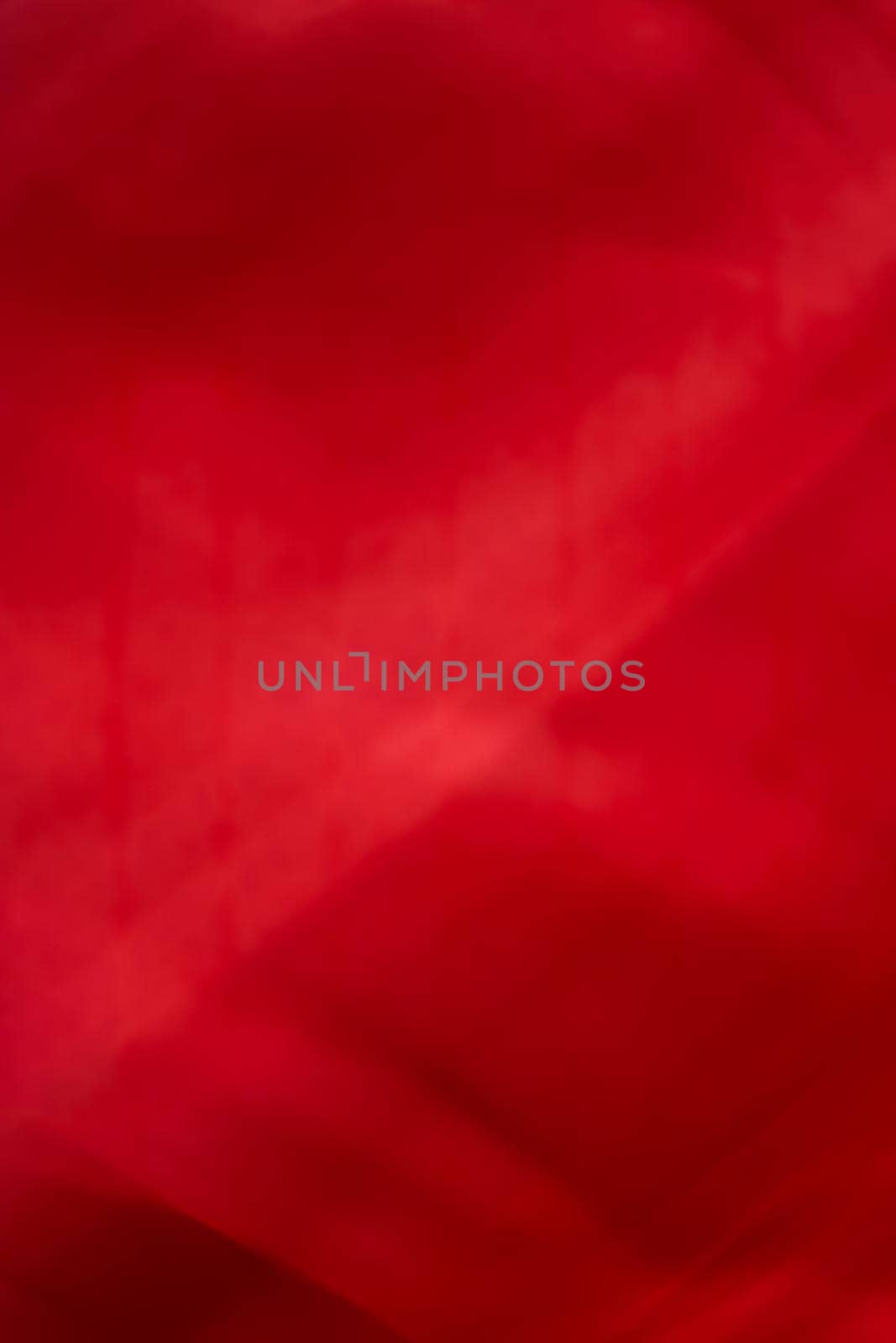 Holiday branding, beauty glamour and love backgrounds concept - Red abstract art background, silk texture and wave lines in motion for classic luxury design