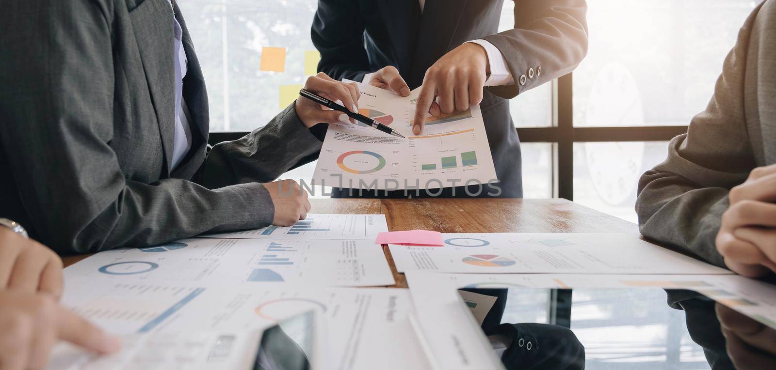 Team of business people working together in the meeting room office, teamwork background charts and graphs banner, double exposure successful teamwork,business planning concept..