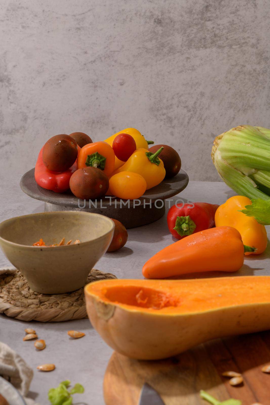 Autumn vegetables arranged on a kitchen worktop by homydesign