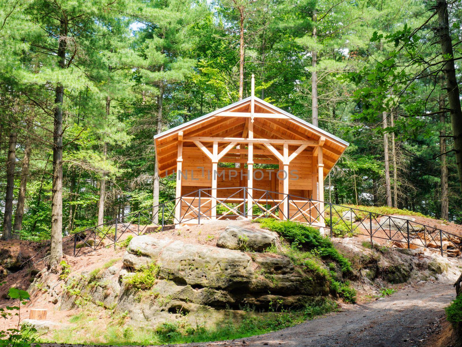 Morning sun shinning on the picnic and tourists shelter in popular Czech Switzerland park, Czech Republic.