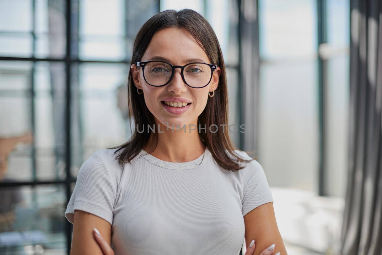 Portrait of a young business woman in an modern office