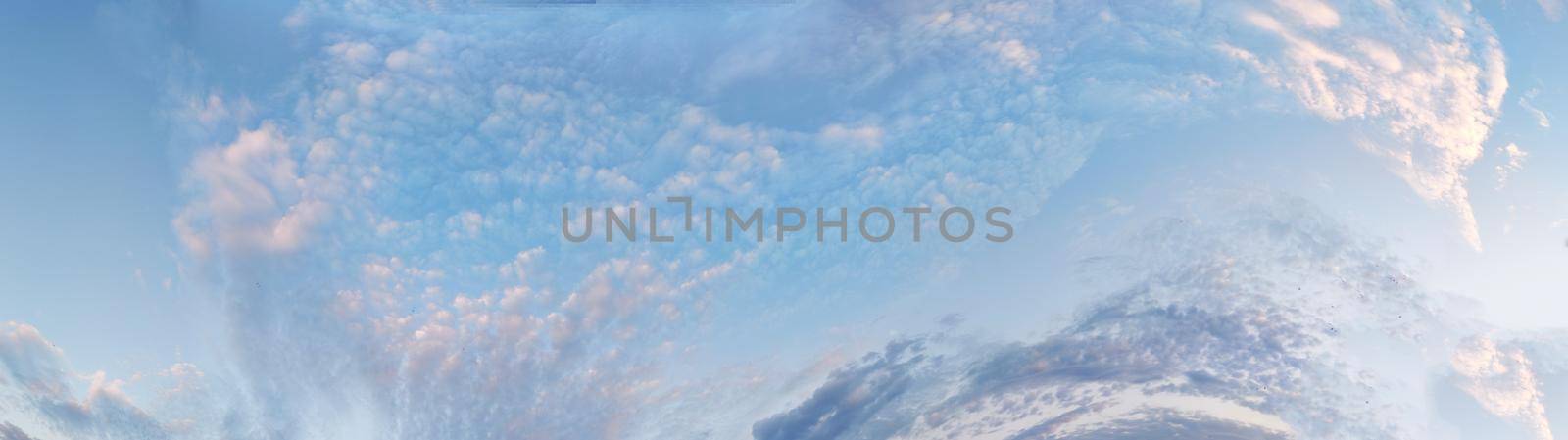 horizontal blue sky panorama with pink clouds for atmospheric background by Annado