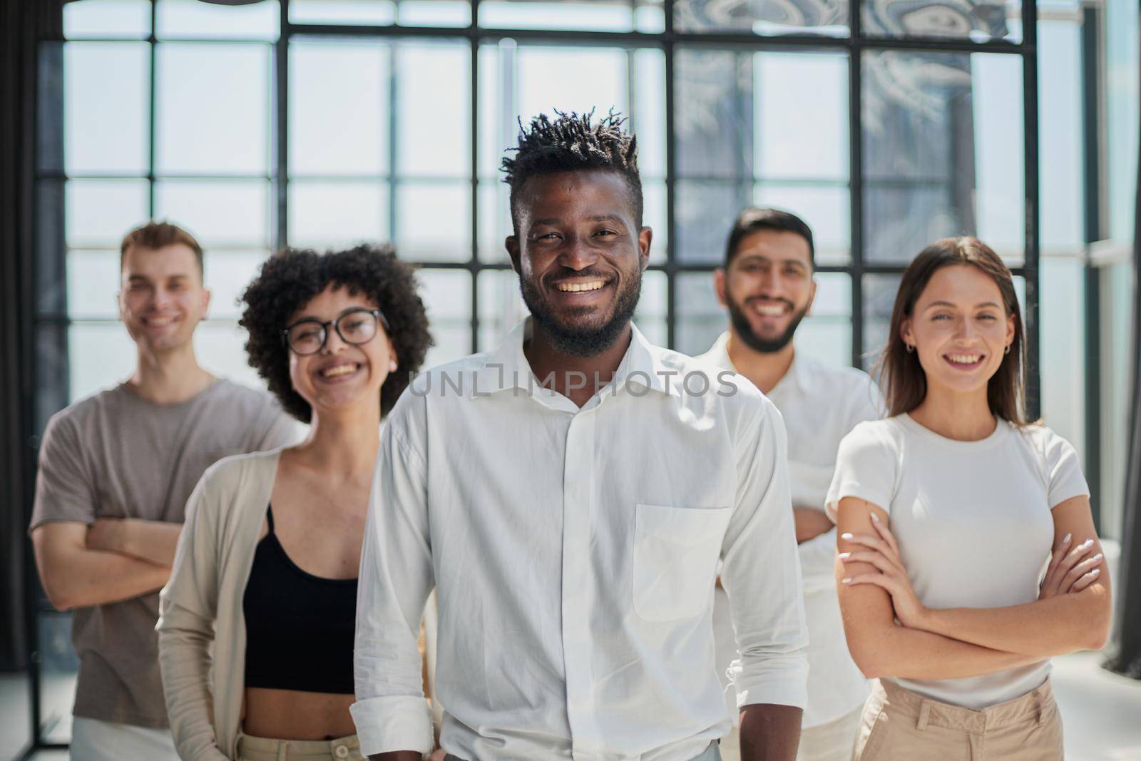 Face of beautiful woman on the background of business people