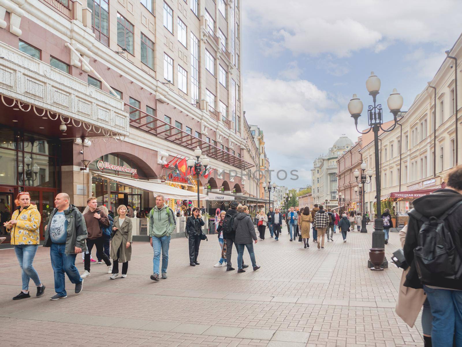 MOSCOW, RUSSIA - September 17, 2022. Local people and tourists walk on famous Arbat street.