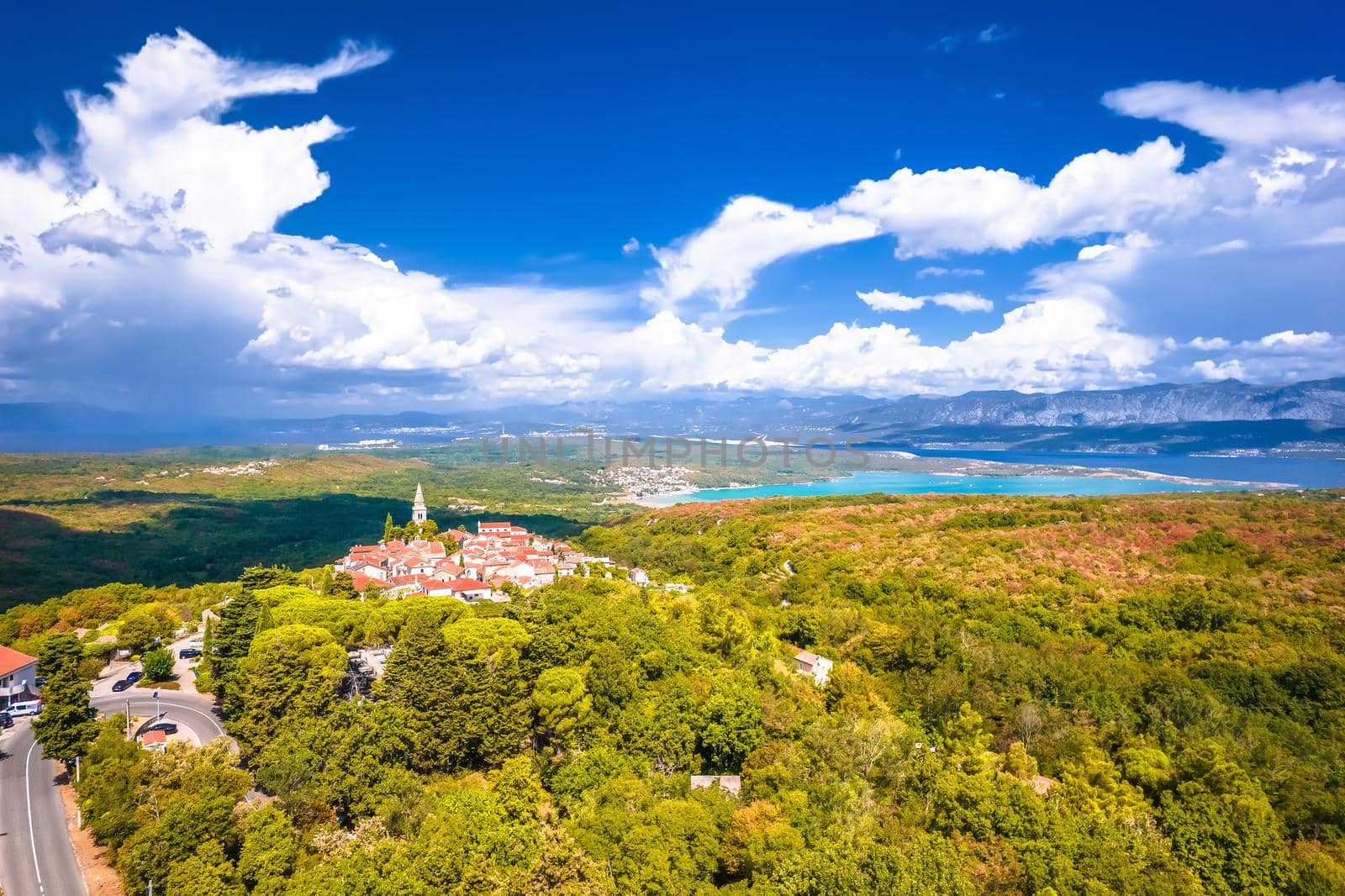 Historic town of Dobrinj and turquoise Soline bay aerial panoramic view by xbrchx