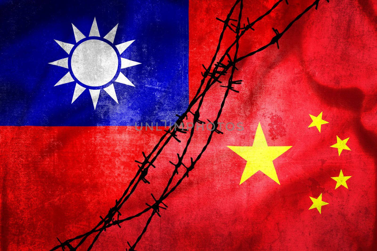 Grunge flags of Taiwan and China divided by barb wire illustration by xbrchx