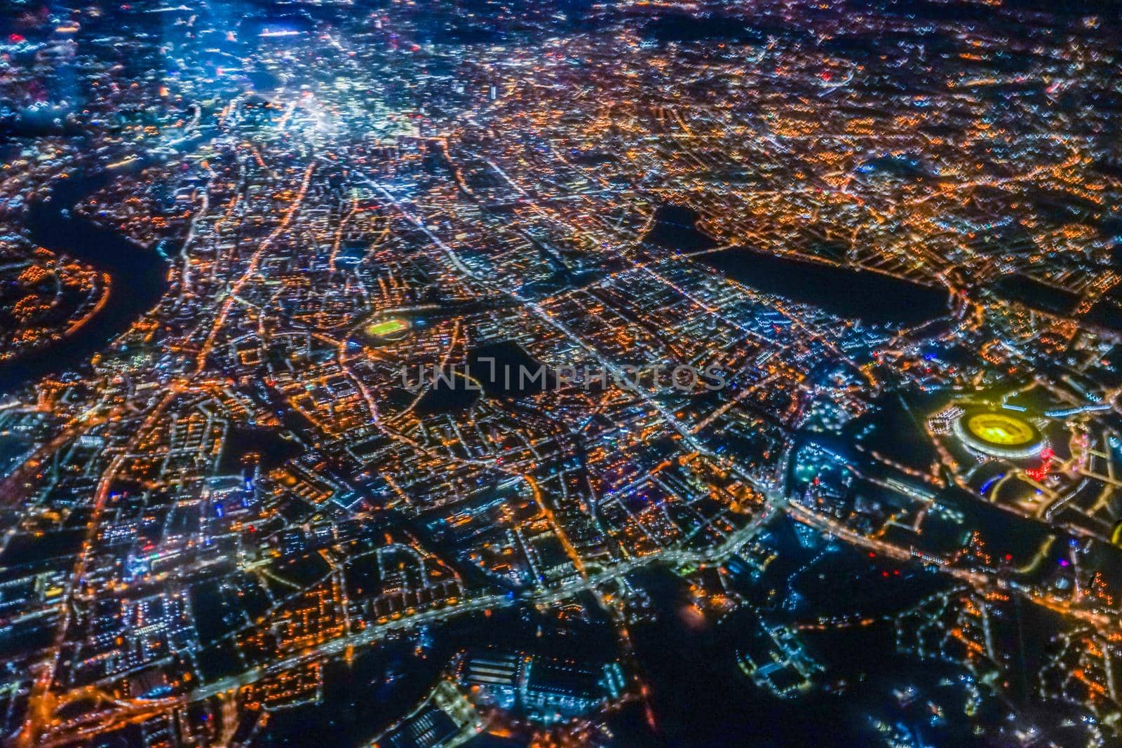 Night view of London seen from the plane. Shooting Location: United Kingdom, London