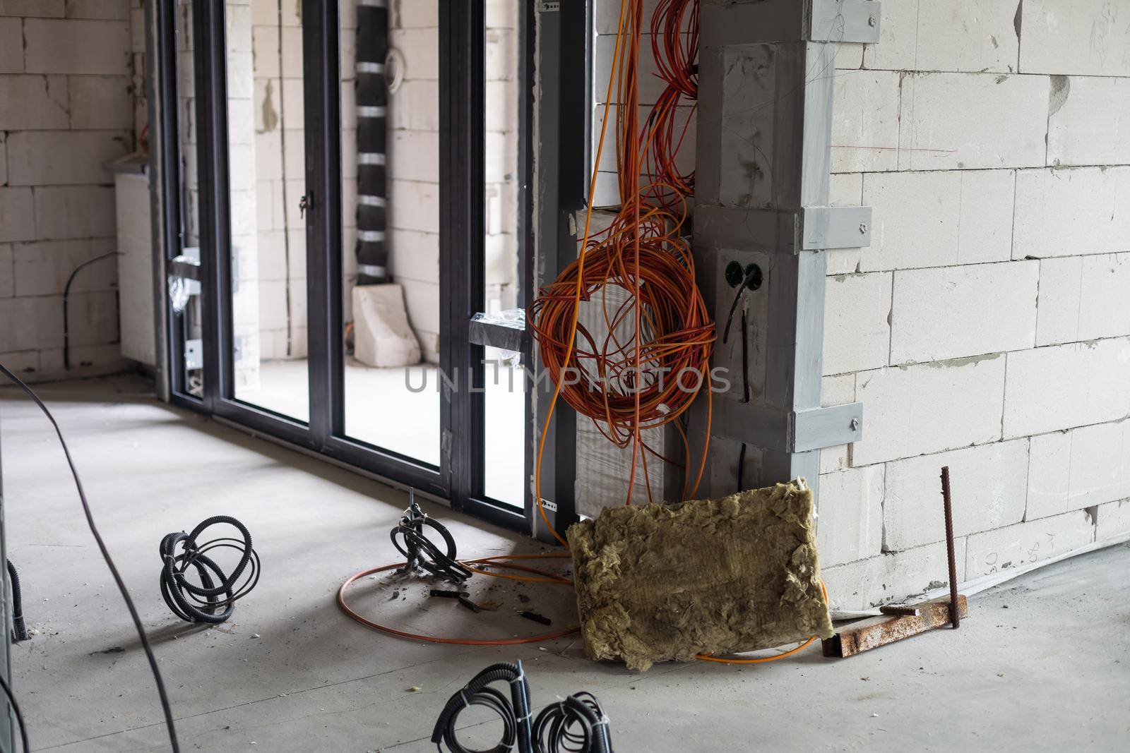 Electrical wiring work at a construction site. Wire extension