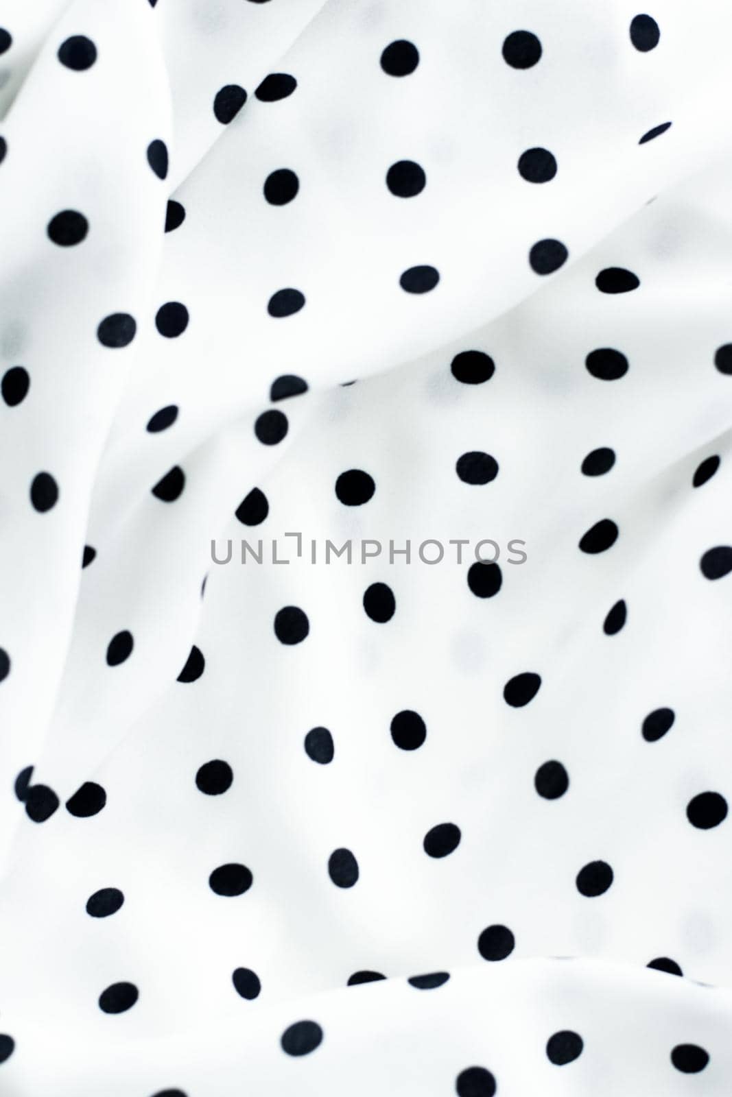Fashion design, interior decor and vintage material concept - Classic polka dot textile background texture, black dots on white luxury fabric design pattern