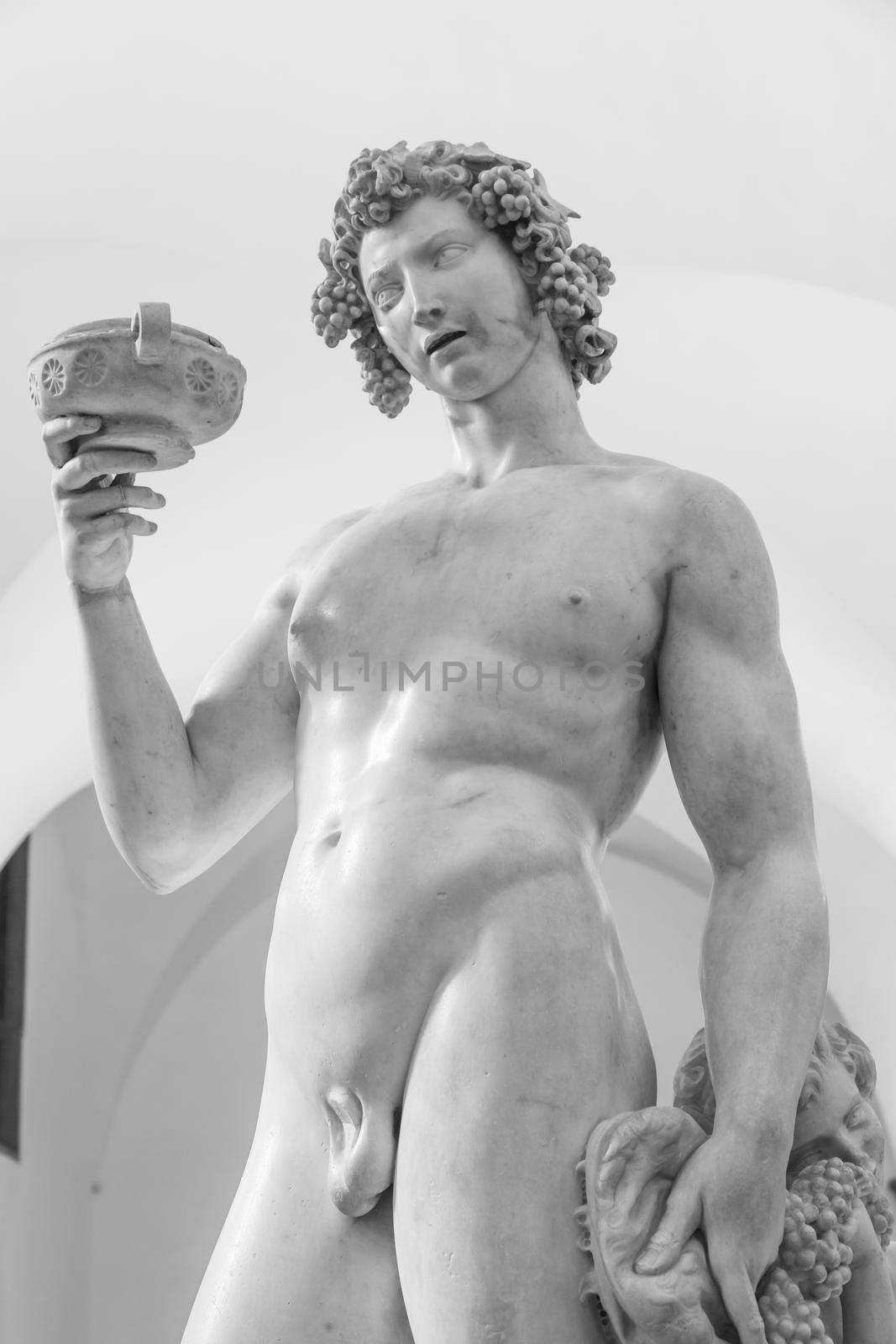Florence, Italy - Circa June 2021: Bacchus by Michelangelo Buonarroti, 1501. Ancient sculpture made of white marble