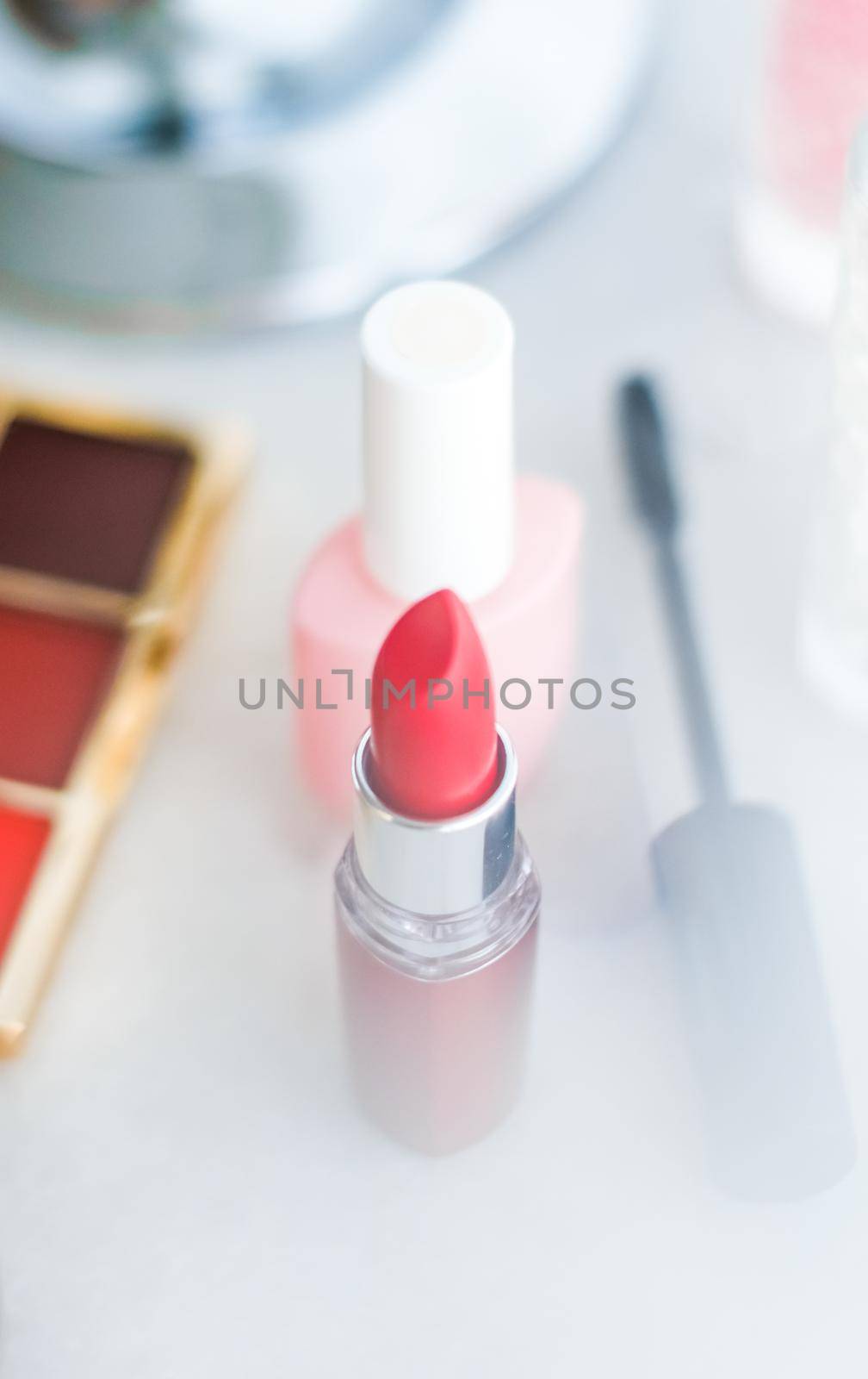 Cosmetic branding, girly and glamour concept - Cosmetics, makeup products on dressing vanity table, lipstick, foundation base, nailpolish and eyeshadows for luxury beauty and fashion brand ads design