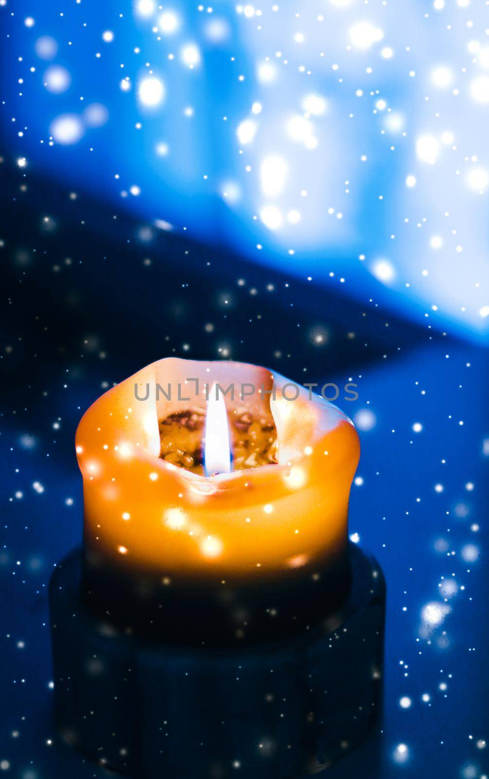 Yellow holiday candle on blue sparkling snowing background, luxury branding design for Christmas, New Years Eve and Valentines Day by Anneleven
