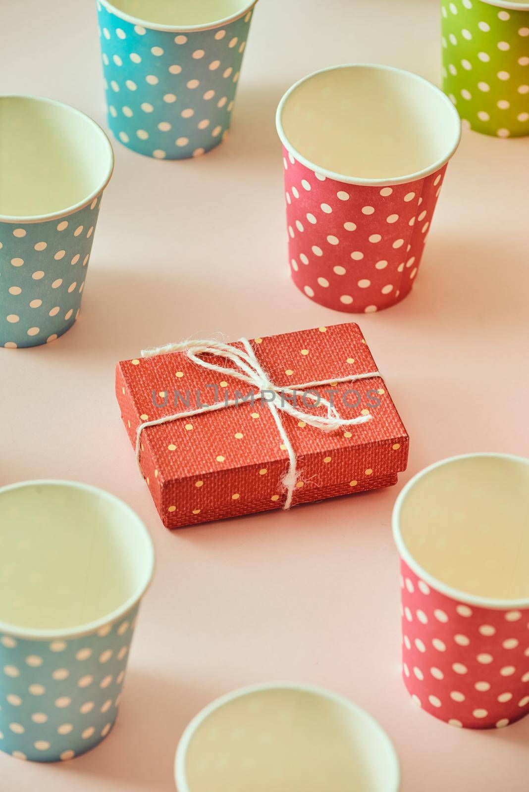 Flatlay with gifts in wrapped boxes top view on pastel color background