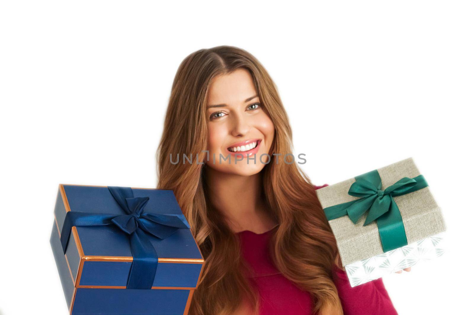 Birthday, Christmas gifts or holiday present, happy woman holding gift boxes isolated on white background, portrait